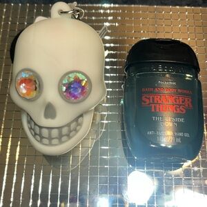 #614-Bath & Body Works Light-Up Skull PocketBac Holder w/upside down Sanitizer